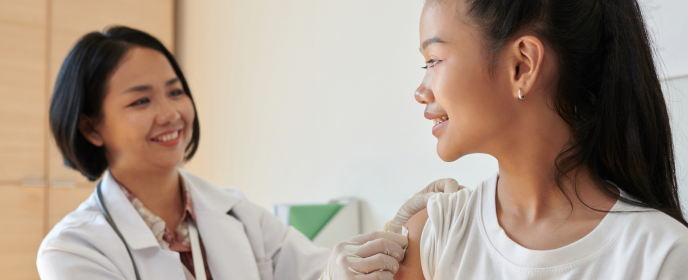 woman getting vaccine