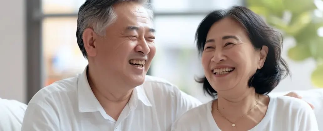 an old couple smilling